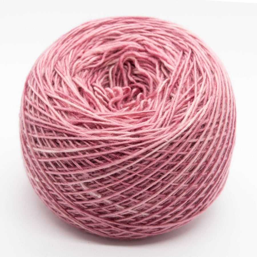 Naturally dyed merino/ cashmere/ silk blend singles yarn in light strawberry pink