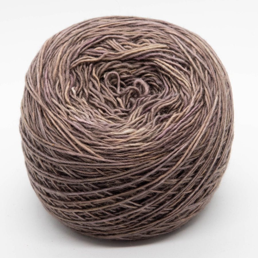 Naturally dyed merino/ cashmere/ silk blend singles yarn in pewter-bronze