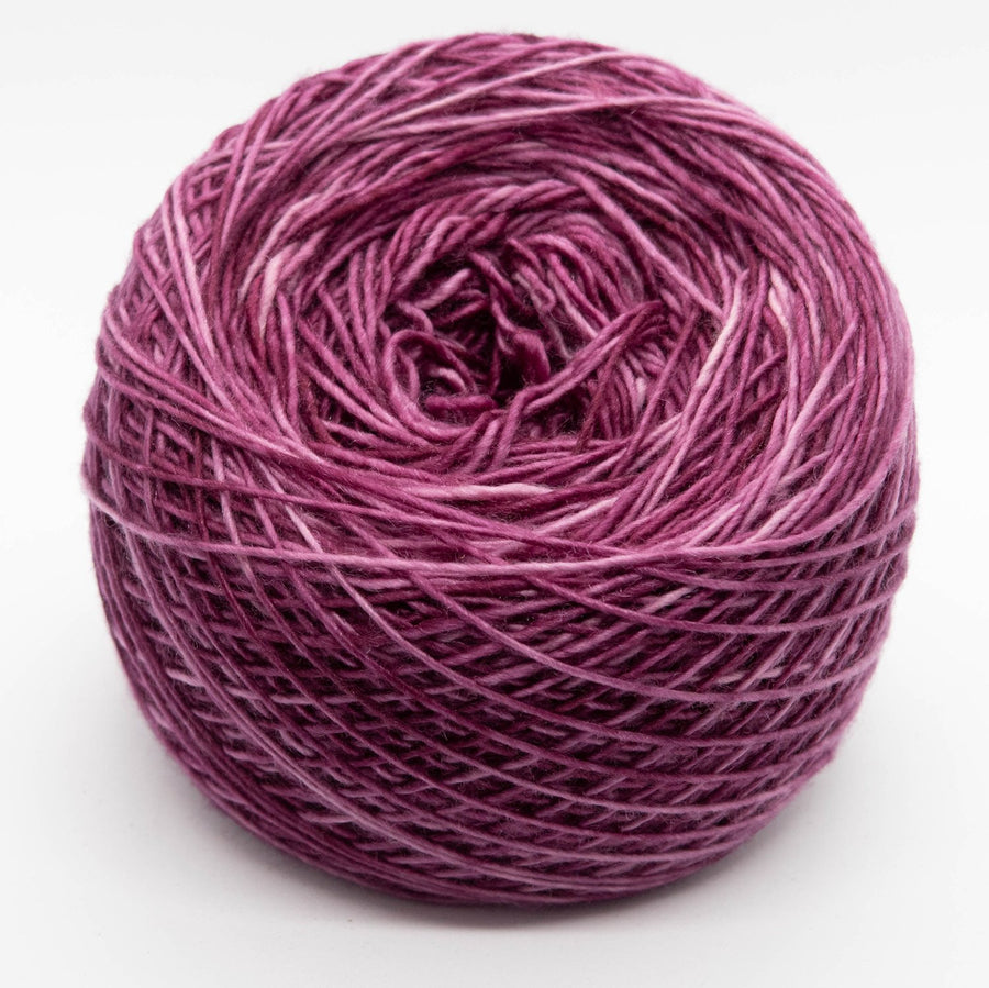 Naturally dyed merino/ cashmere/ silk blend singles yarn in purple berry