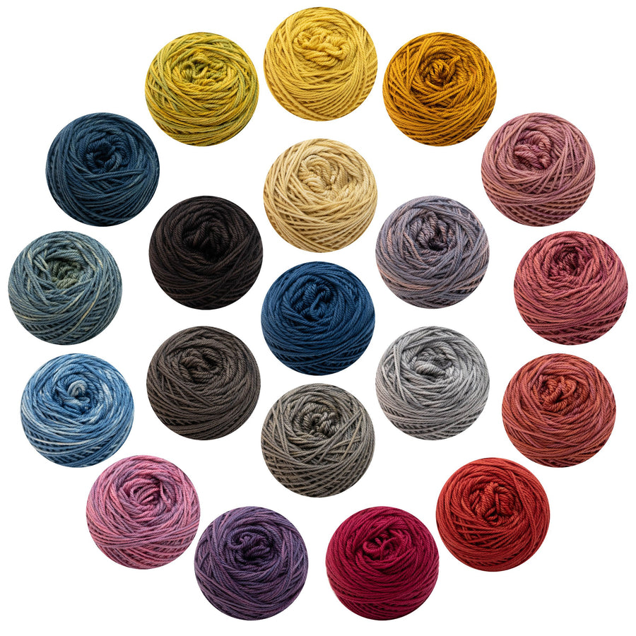 Full colour collection of pure merino DK Naturally dyed yarn arrange in two circles