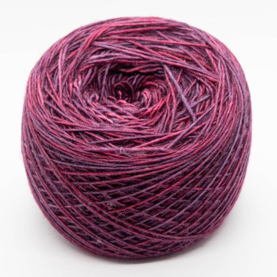 Naturally dyed merino/ cashmere/ silk blend singles yarn in deep purple