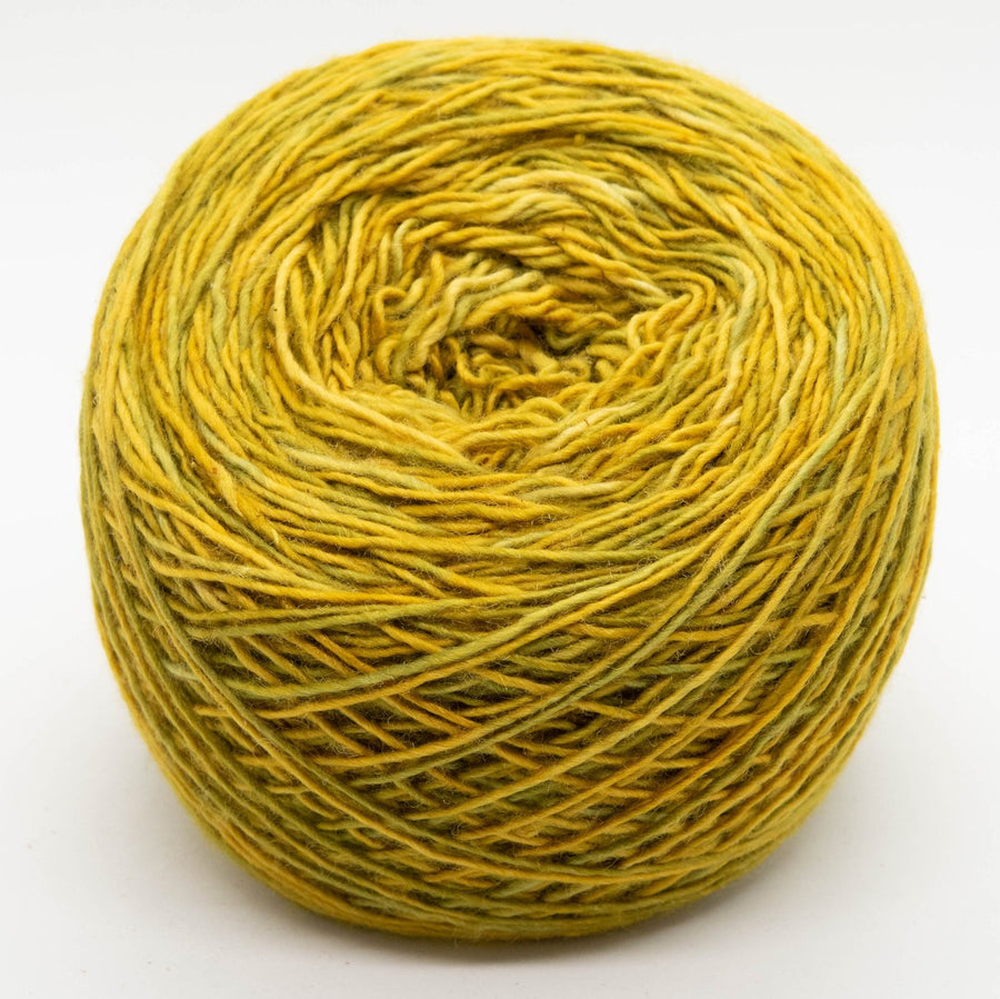 Naturally dyed merino/ cashmere/ silk blend singles yarn in golden green